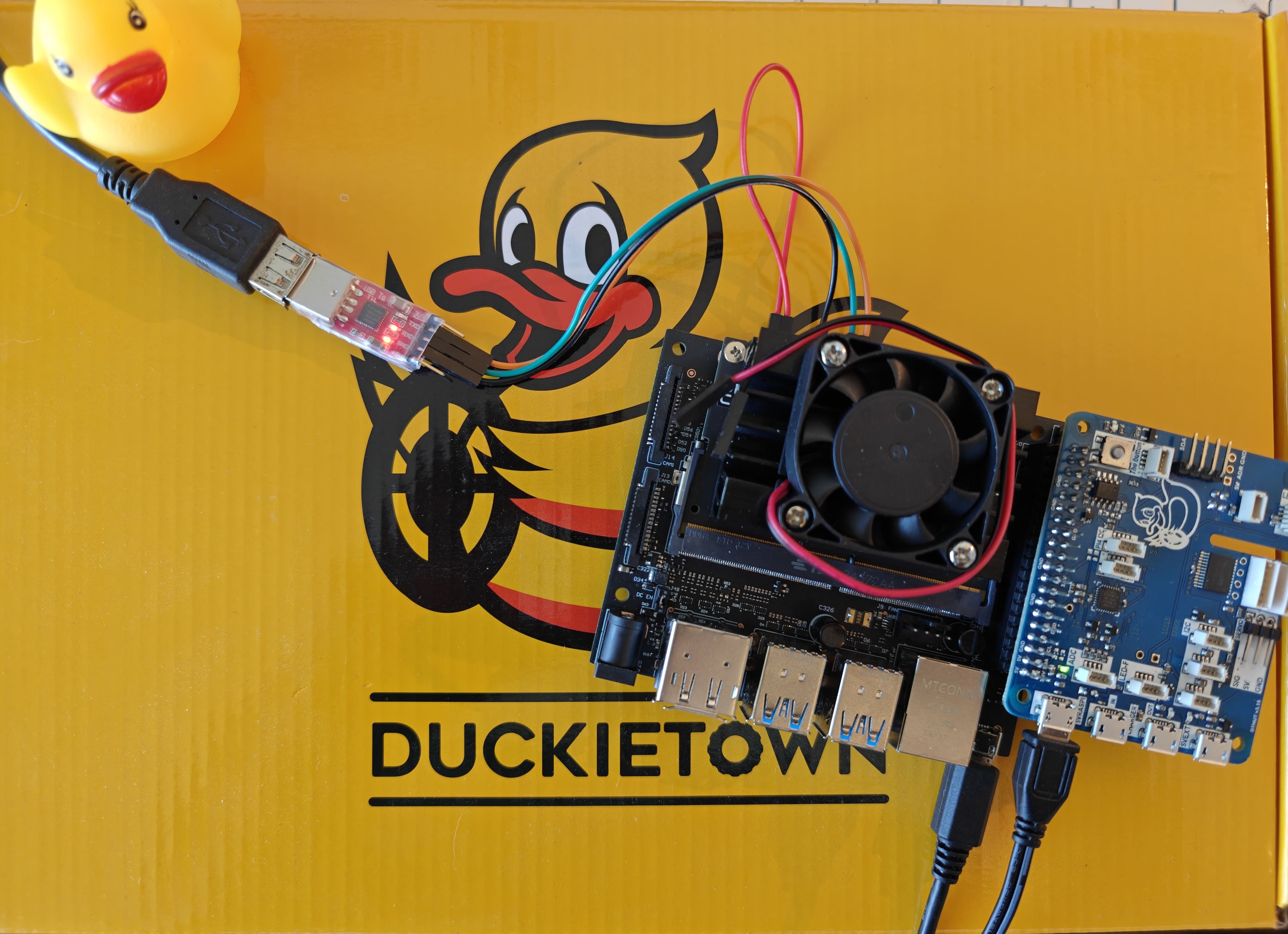 A UART serial cable connected to a Jetson Nano.