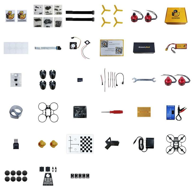 Components included in the Duckiedrone DD24 box, including essential parts for building the drone.