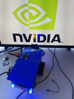 Duckiebot connected to a screen with flickering NVIDIA logo, failing to boot